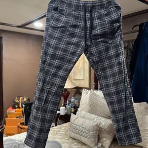 Hollister young men plaid almost new, black and grey joggers.